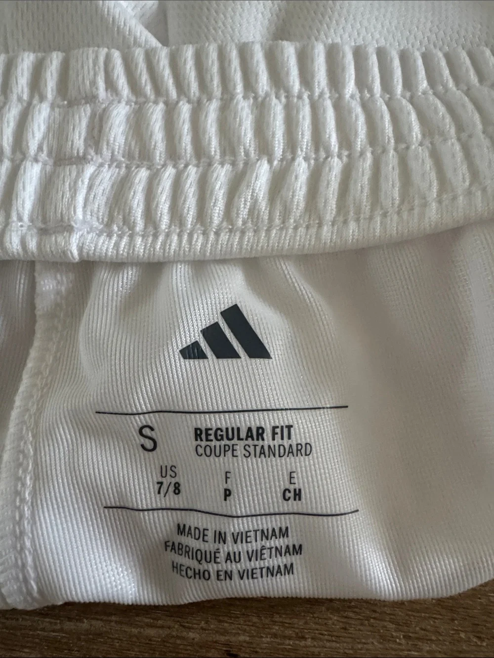 adidas White Mesh Athletic Shorts with Pastel Rainbow Stripes